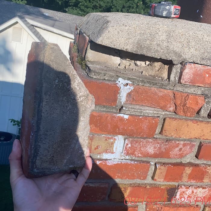 Evaluating a masonry chimney with loose bricks