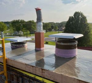 Well-sealed chimney crown on a Kansas City home by Chimney Restoration of Kansas City