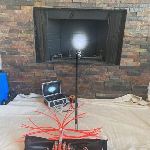 Camera fireplace inspection by certified chimney sweep company in kansas city