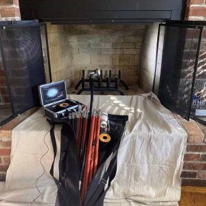 Fireplace with chimney inspection equipment