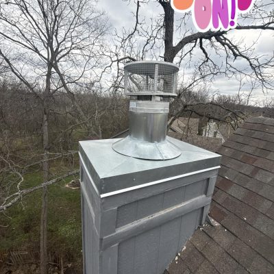 Completed Stainless Steel Pre-fabricated Fireplace Chase Cover chimney Cap installed on siding chimney in Kansas City