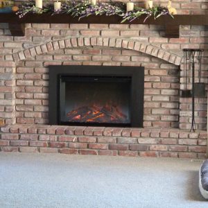 Fireplace Insert Installed in Brick Arched Fireplace - Chimney Restoration of KC