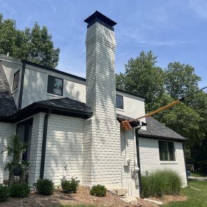 Masonry Chimney with Kansas City Chimney Cap Installation - Chimney Restoration of Kansas City