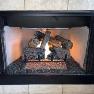 Newly Installed Gas Logs Burning in Fireplace after chimney sweep and inspection in Kansas City
